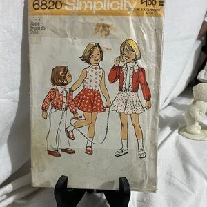 Simplicity Children's Dress Pattern with Red and White Designs